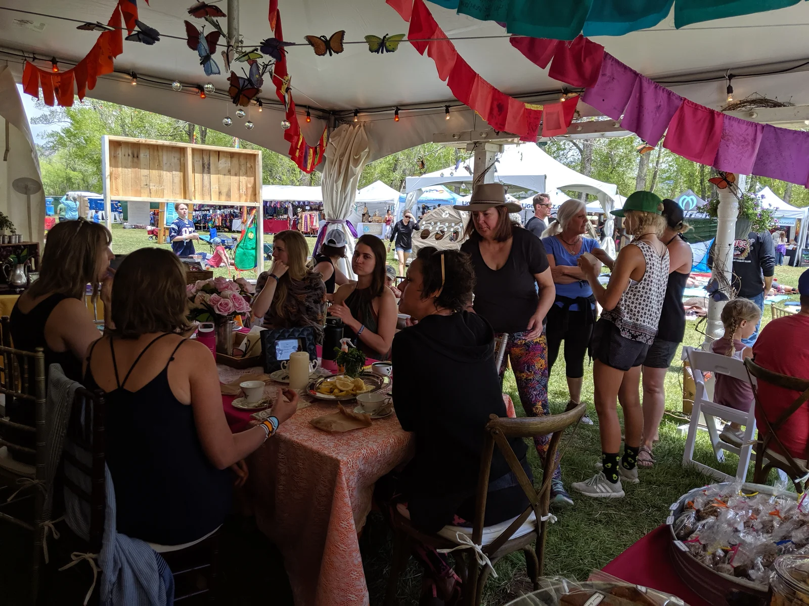Packed Emmy's Friends tent at Campout 2019 with festival behind