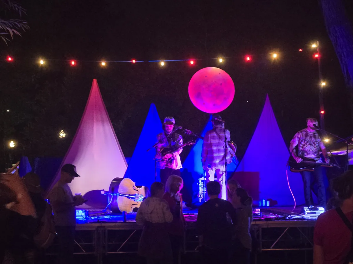 Smalltown Gathering 2025, night performance at Riverside Park, Salida CO