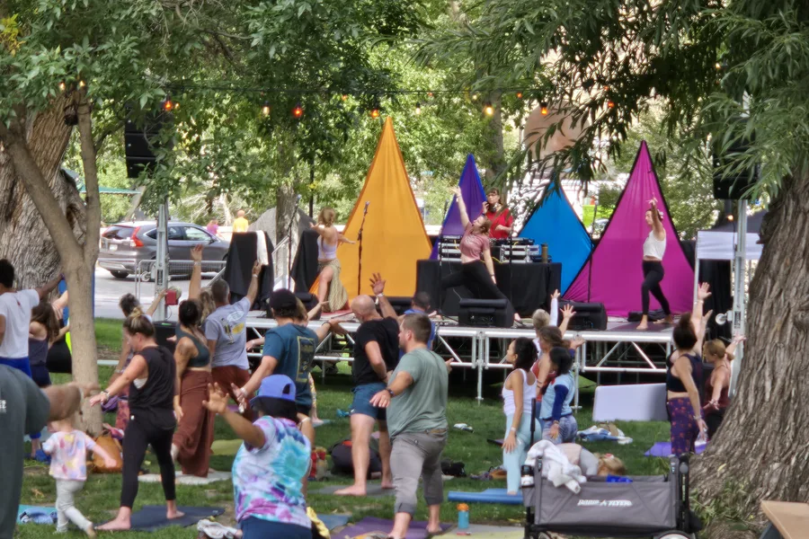 Outdoor yoga and movement session at Smalltown Gathering